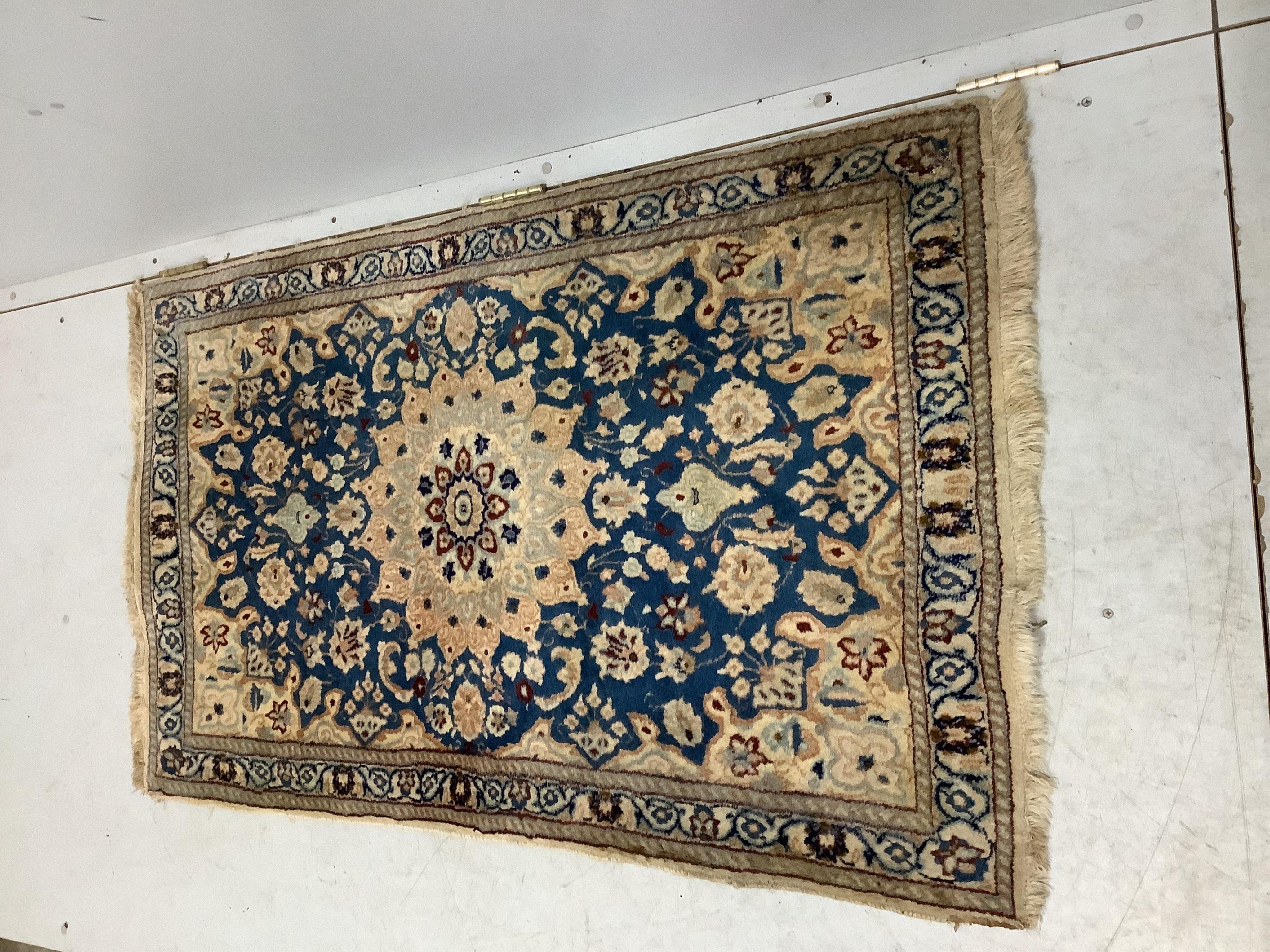 Three North West Persian style rugs and one other rug, largest 200 x 110cm. Condition - poor to fair